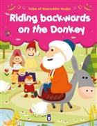 Riding Backwards on the Donkey Tima ocuk